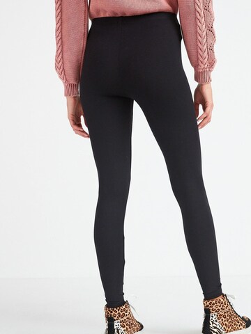 Skinny Leggings di Next in nero