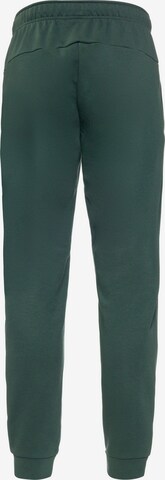 NIKE Tapered Workout Pants 'Dry Taper' in Green