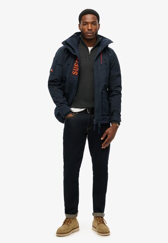 Veste mi-saison 'Ultimate' Superdry en noir