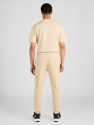 Tapered Pantaloni cargo di Calvin Klein Jeans in beige