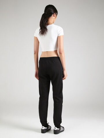 Regular Pantalon de sport 'LGC SHAI' Hummel en noir