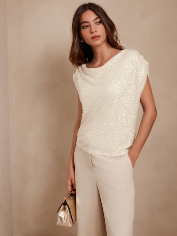 Next Topp i beige: framsida
