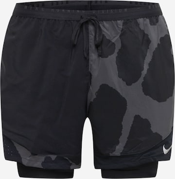 NIKE - Pantalón deportivo 'STRIDE' en negro: frente