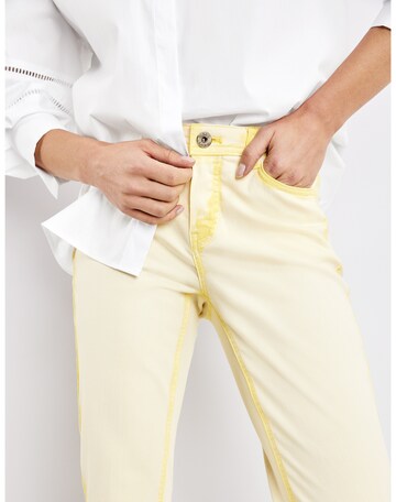 TAIFUN Boot cut Jeans in Yellow