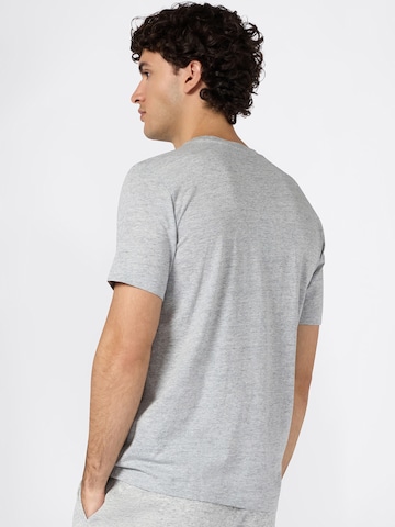 Maglietta di Champion Authentic Athletic Apparel in grigio