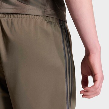 ADIDAS ORIGINALS Regular Pants 'Firebird' in Brown