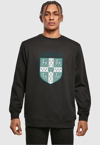 Merchcode Sweatshirt 'University Of Cambridge - Shield' in Zwart: voorkant