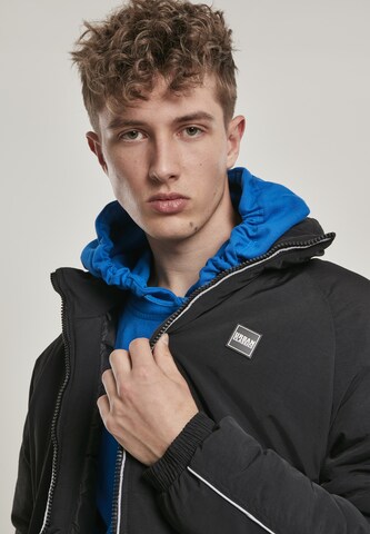 Urban Classics Between-Season Jacket 'Reflective Piping' in Black