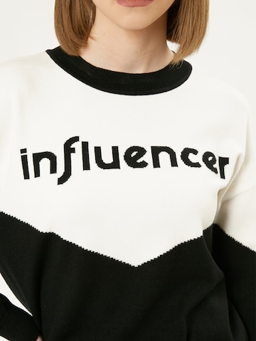 Influencer Sweter w kolorze czarny