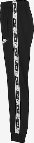 Tapered Pantaloni de la Nike Sportswear pe negru