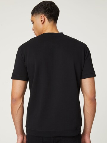 DAN FOX APPAREL T-Shirt 'Christos' in Schwarz