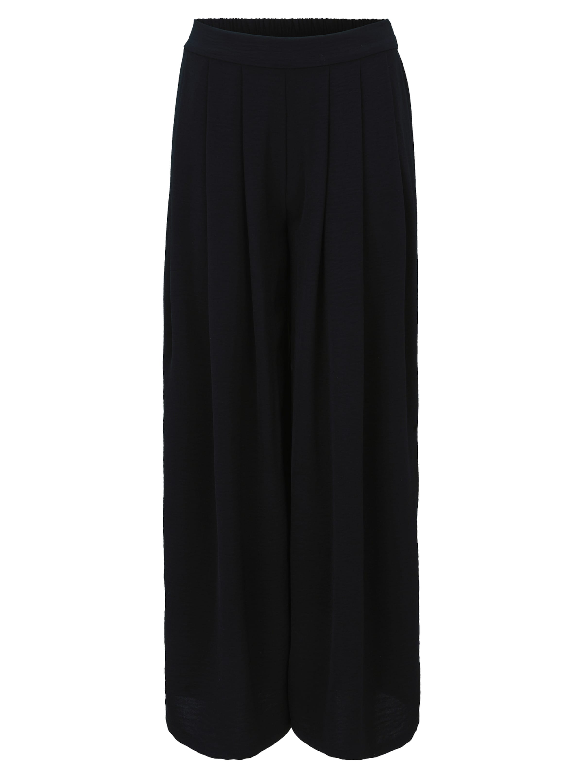 Loosefit Pantalon à pince Cartoon en noir : devant