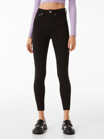 Bershka Skinny Jeans in Black: front