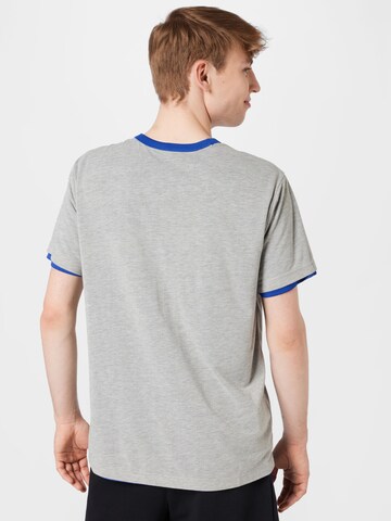 Champion Authentic Athletic Apparel Funkční tričko – modrá