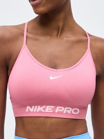 NIKE - Soutien Bustier Soutien de desporto 'Nike Pro' em rosa
