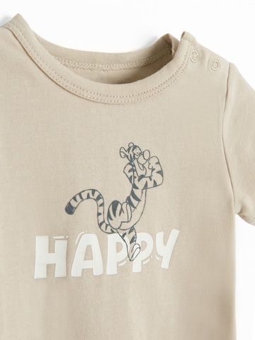 Cool Club Romper/bodysuit in Beige