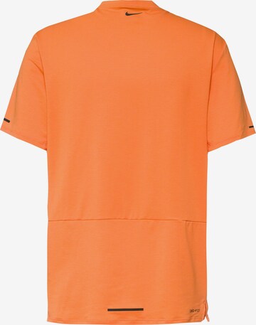 NIKE Performance Shirt 'Rise 365' in Orange