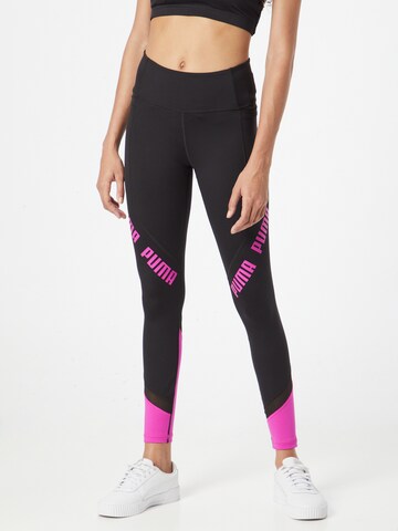 PUMA Skinny Workout Pants in Black: front