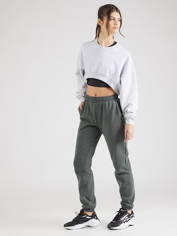 Athlecia Tapered Sports trousers 'Ruthie' in Green