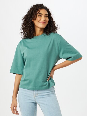 T-shirt Urban Classics en vert : devant