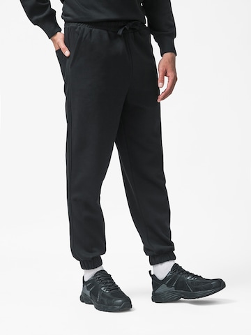 L'Arte Milano Tapered Hose‌‌‌ in Schwarz