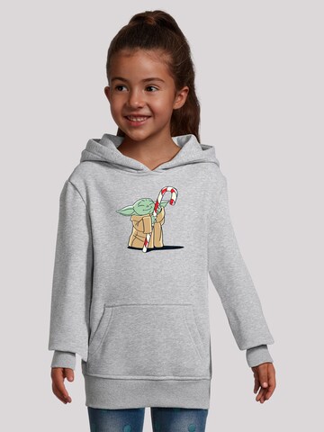 F4NT4STIC Pullover 'Star Wars Grogu Loves Candy' in Grau: Vorderseite