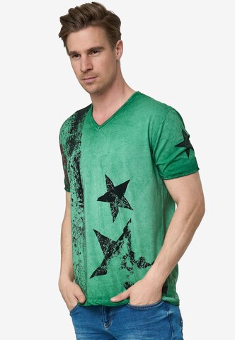 Rusty Neal Cooles T-Shirt mit V-Ausschnitt in Grün: predná strana