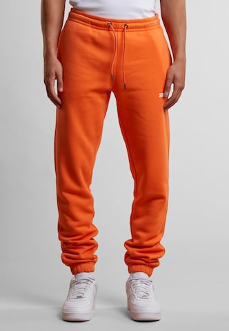 Starter Black Label Tapered Pants 'Essential' in Orange: front