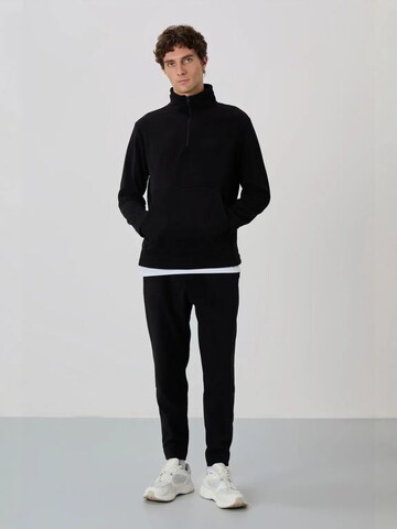 Regular Pantalon Tommy Life en noir
