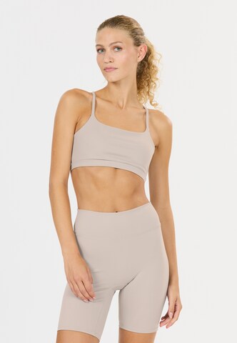 Athlecia Low Support Sport-BH 'Blossom' in Grau: Vorderseite