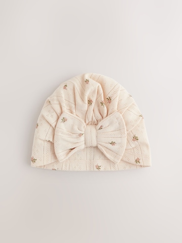 Bonnet Next en beige