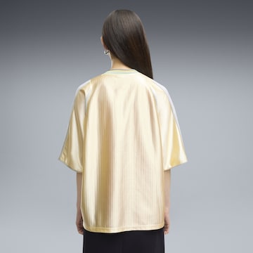 PUMA Shirt 'T7 ' in Geel