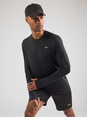 Reebok Koszulka funkcyjna w kolorze czarny: przód