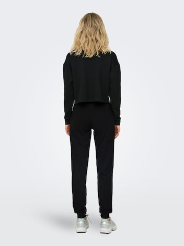 ONLY PLAY Tapered Sportbyxa i svart