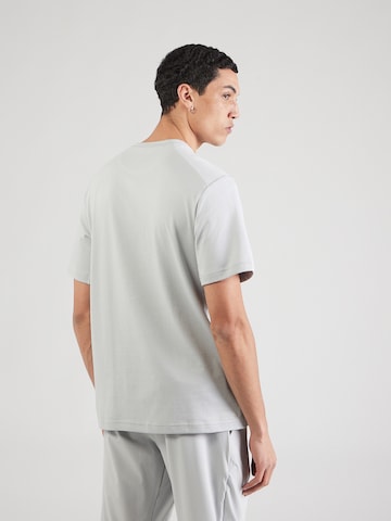 NIKE Funktionsskjorte 'PRIMARY' i grå