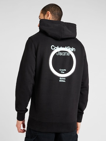 Calvin Klein Jeans Sweatshirt 'ECLIPSE' in Zwart: voorkant