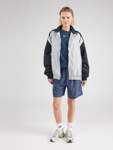 Nike Sportswear Collegepaita 'Phoenix Fleece' värissä sininen
