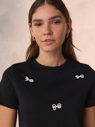 Next T-shirt i svart