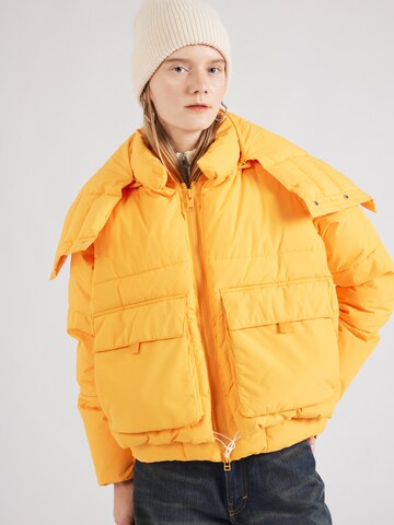 Embassy of Bricks and Logs Between-Season Jacket 'HARLEM' in Yellow: front