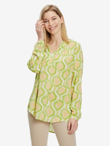 Cartoon Blouse in Geel: voorkant