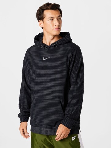 NIKE Sport sweatshirt i svart: framsida