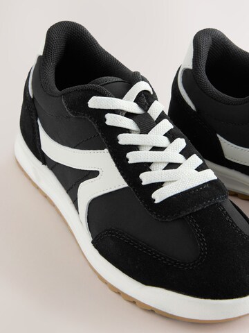 Baskets Next en noir