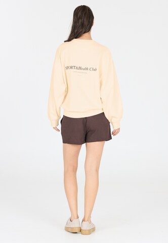 Athlecia Sports sweatshirt 'Cabell' in Beige