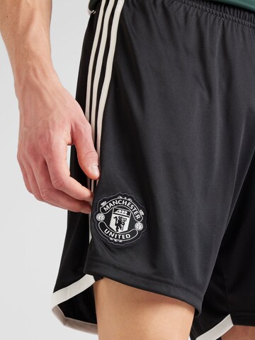 ADIDAS PERFORMANCEregular Sportske hlače 'Manchester United 23/24' - crna boja