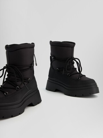 Bershka Snow Boots in Black