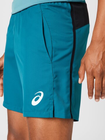 Regular Pantaloni sport de la ASICS pe verde