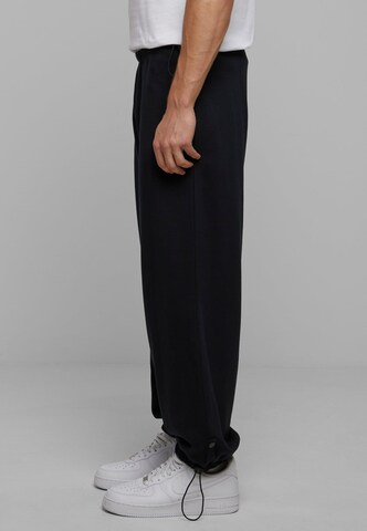 Urban Classics - Loosefit Pantalón en negro