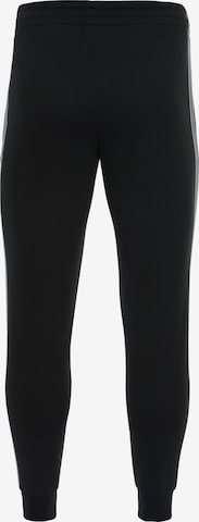 ADIDAS SPORTSWEAR Tapered Sports trousers in Black