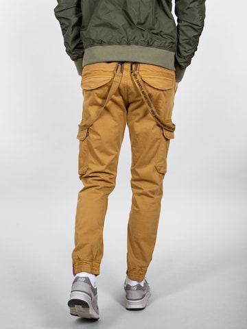 ALPHA INDUSTRIES Tapered Cargo trousers in Beige