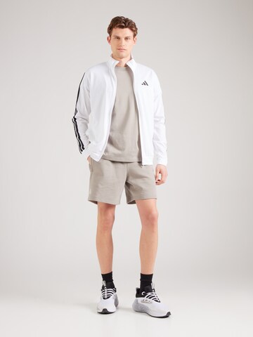 Loosefit Pantaloni sportivi di ADIDAS PERFORMANCE in beige